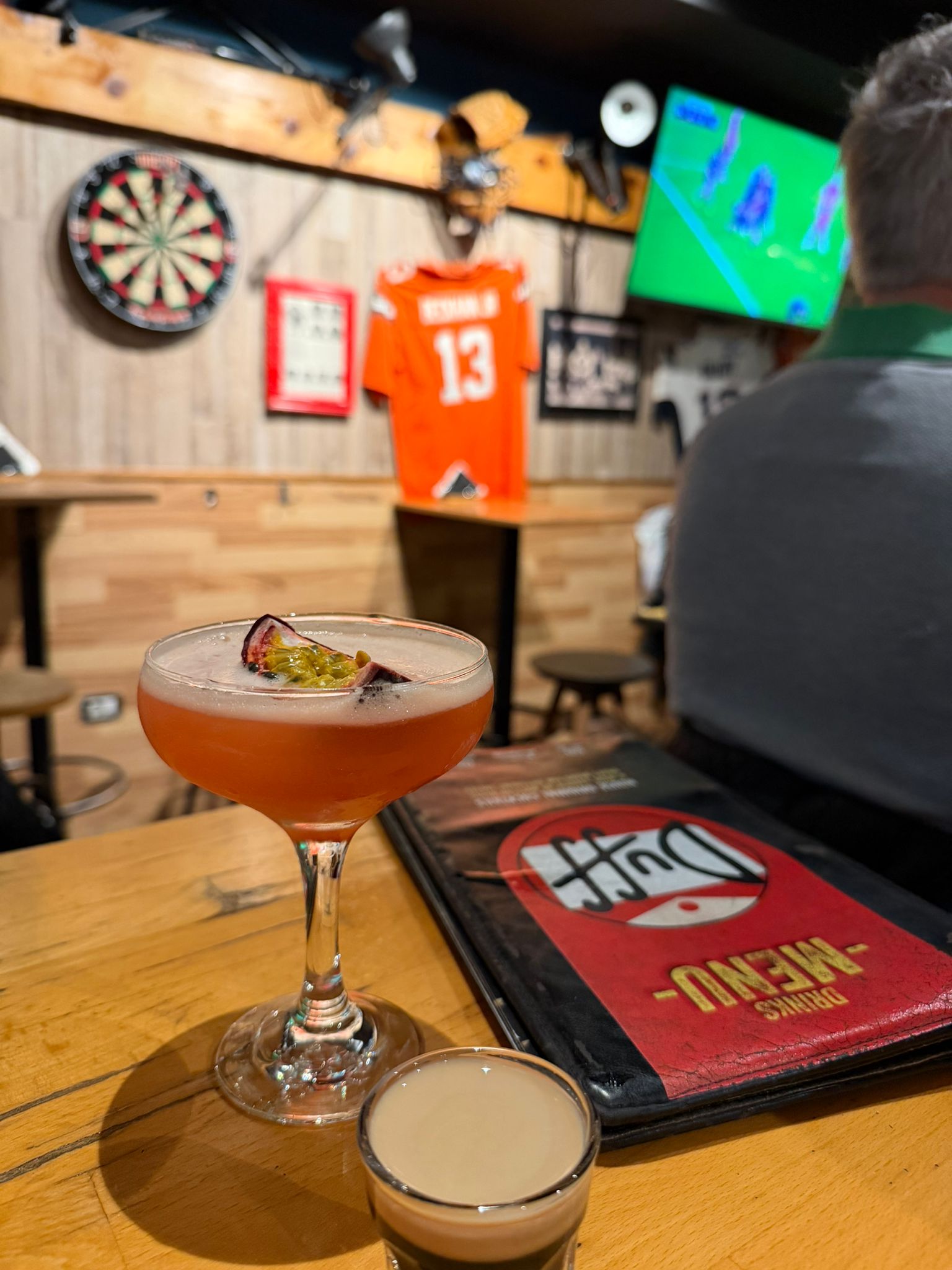 duff-sports-bar-cocktail-garnished-rose-petal