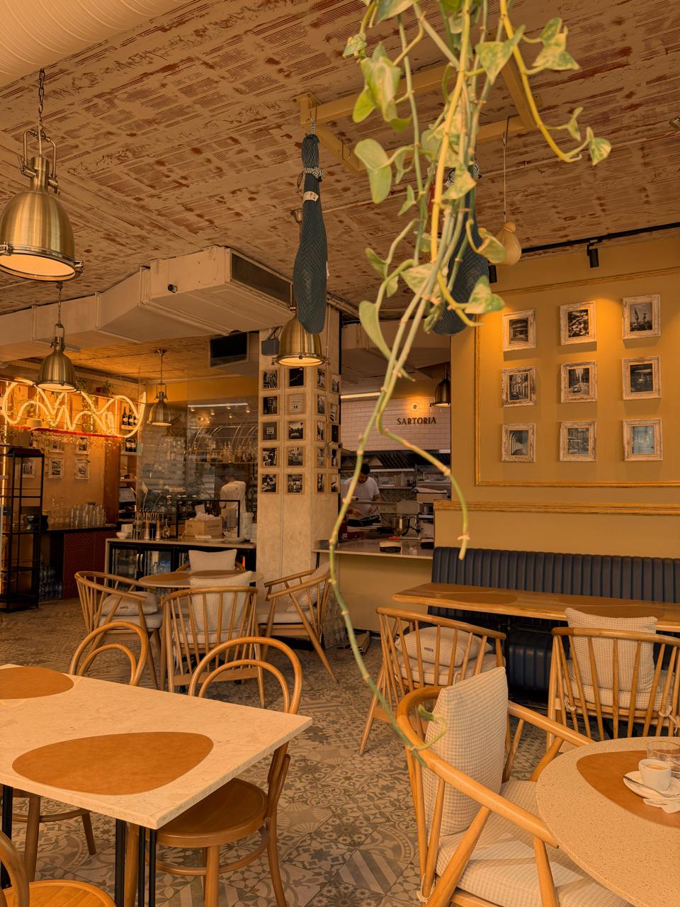 sartoria-bistro-rooftop-cozy-cafe-interior-warm-lighting